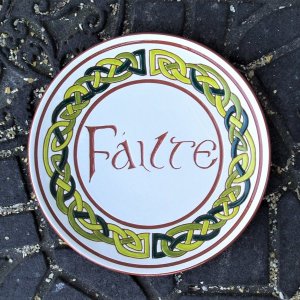 8 in. Failte plate with green braid - $45