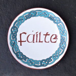 8 in. Failte plate  with teal braid- $45.